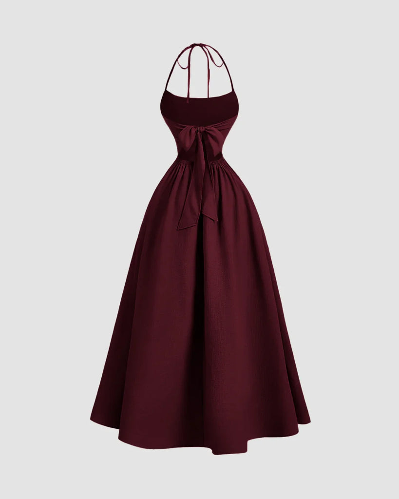 Maroon halter-neck midi dress with a back tie and gathered detailing for a rich, elegant drape.