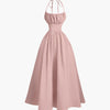Powder pink halter-neck midi dress with a back tie and gathered detailing for a softly elegant drape.