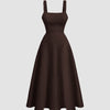 Backless criss-cross bow design flared dress in chocolate, featuring a square neckline and playful detailing for a flattering look.