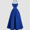 Front view of Royal blue backless maxi dress with halter neckline, fitted waist, and full flowing skirt, shown front and back.
