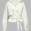 Women wearing White waistcoat with wrap-style front, tie-up waist belt and long sleeves featuring cuff bow details for an elegant look