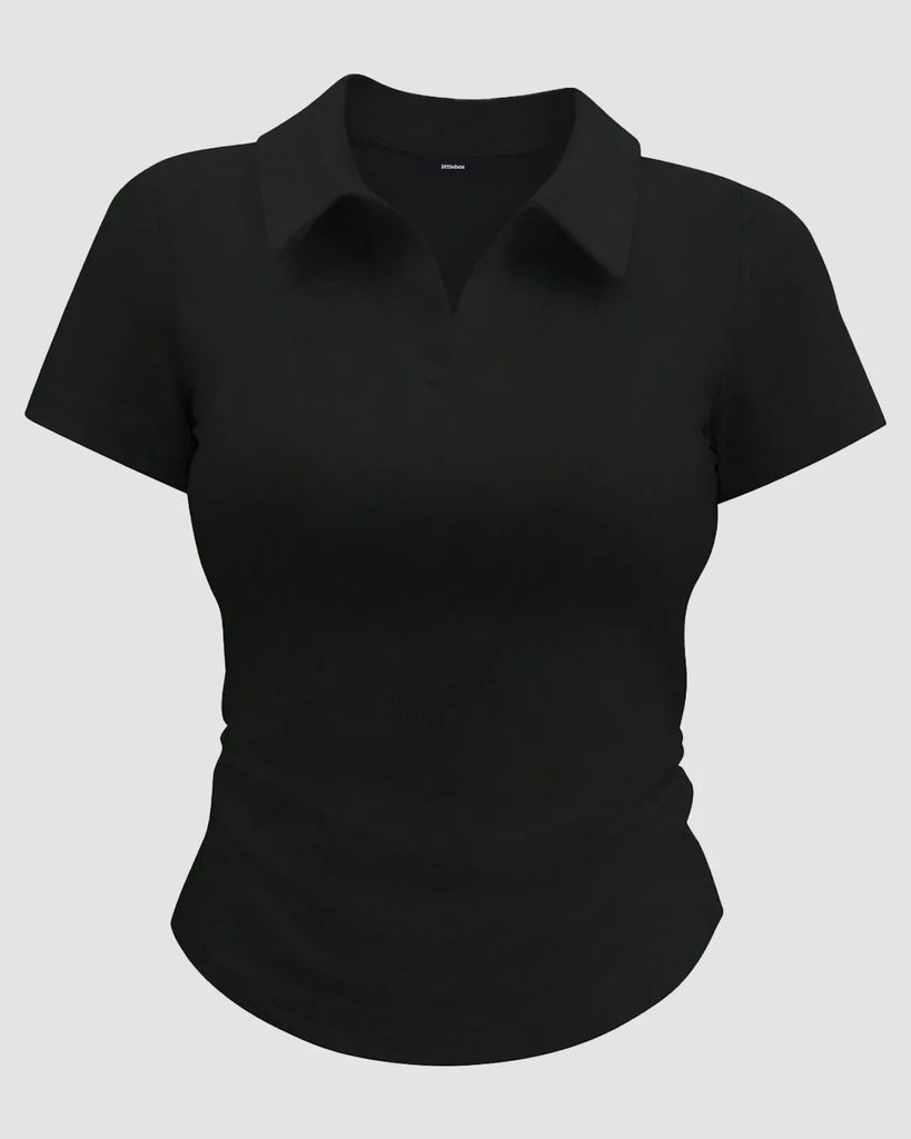 Black polo shirt for women featuring a classic collar design.