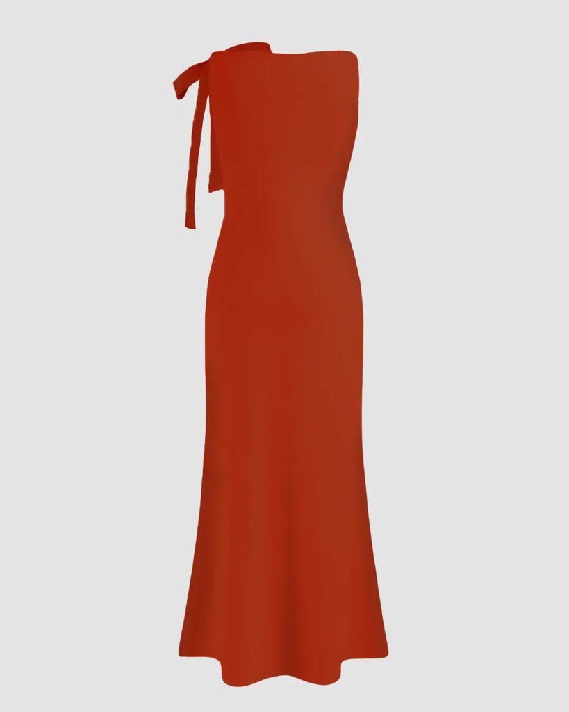A brick red maxi dress featuring a boat neck and a decorative bow at the neckline.