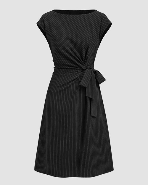 Front view of Black pinstripe knot dress with cap sleeves and a side tie detail, featuring a relaxed fit and knee-length silhouette for a polished look