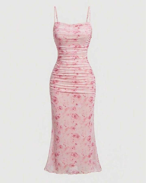 Pink sleeveless floral maxi bodycon dress with a delicate floral print, spaghetti straps, and a draped neckline