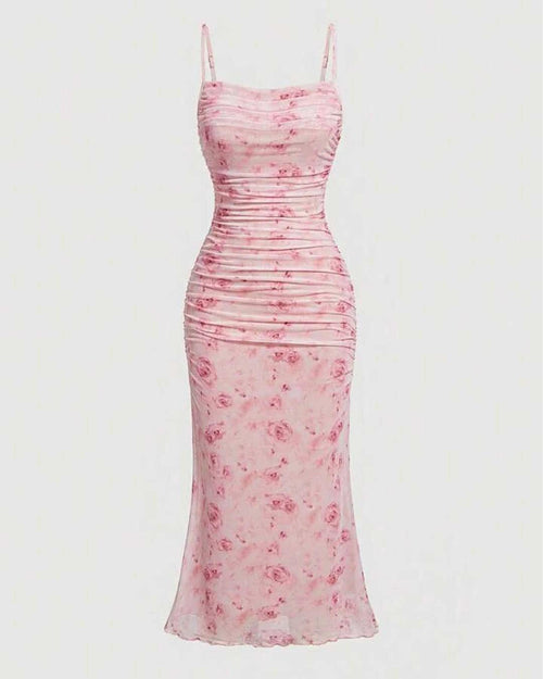 Pink sleeveless floral maxi bodycon dress with a delicate floral print, spaghetti straps, and a draped neckline
