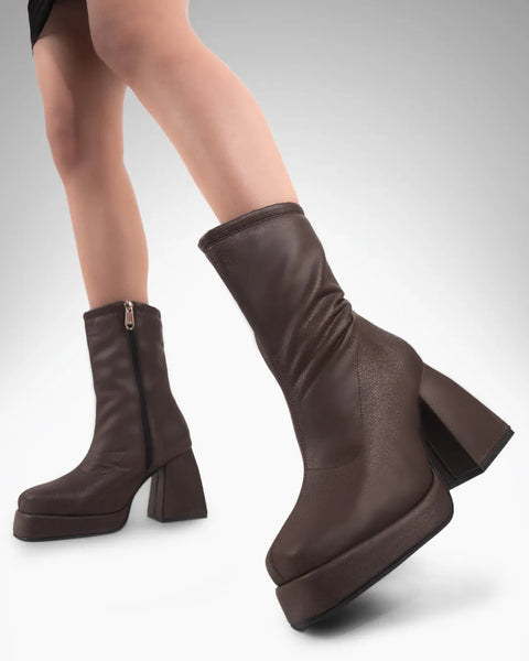 Front view of Brown ankle boots with block heel, smooth leather finish, side zipper closure, and rounded toe for everyday wear.