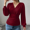 Front view of burgundy v neck long sleeve top with crossover front and ruched waist, stylish burgundy top womens.