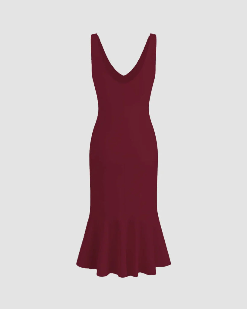 Burgundy sleeveless bodycon dress with a fishtail hem, crafted from soft knit fabric.