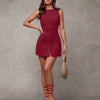 Burgundy button-front sleeveless bodycon mini dress, ideal for a stylish night out.