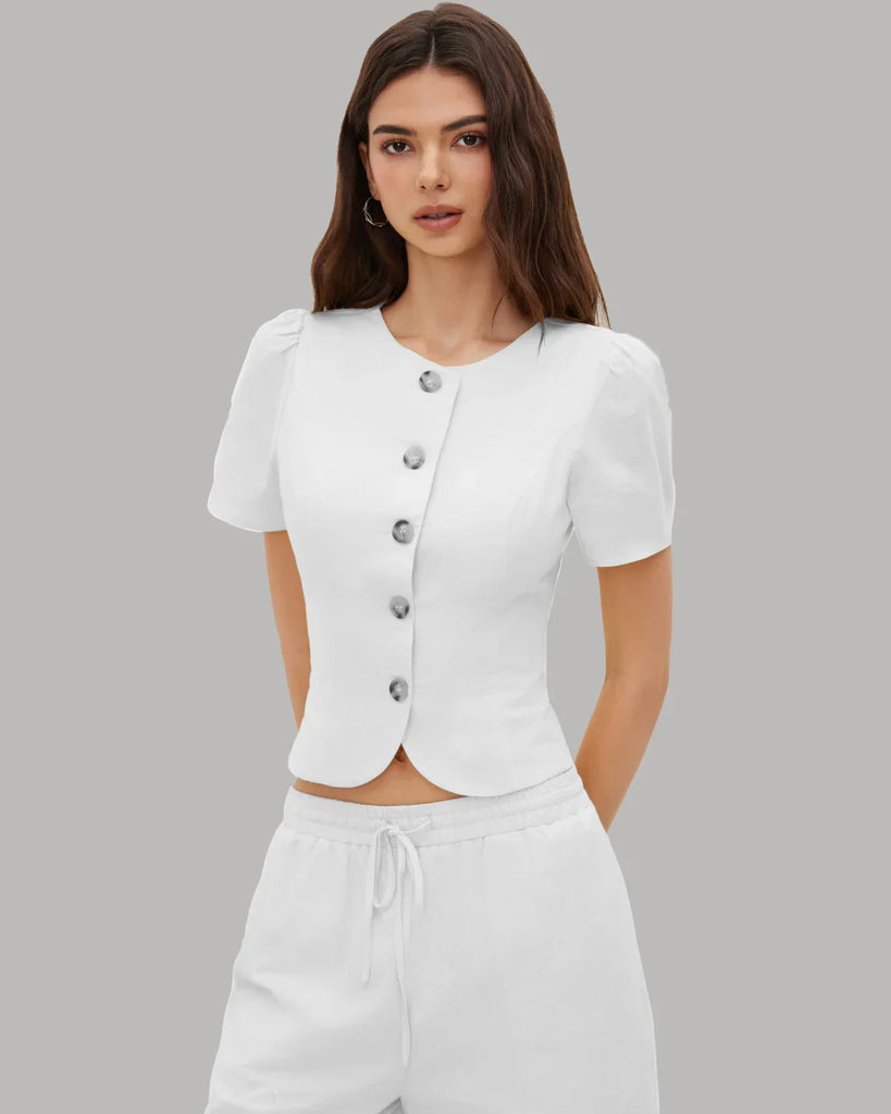 White fitted short sleeve blouse with front buttons, showcasing a classic and elegant design.