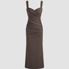 Coca V-neck midi dress featuring a ruched bodice, fitted waist, and subtle fishtail hem for a flattering silhouette.