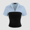 A short-sleeve shirt featuring a two-tone design in black and sky blue with a collar.