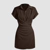 Dark brown mini dress with a collar, wrap design, and buckle detail, made from a shirt dress style.