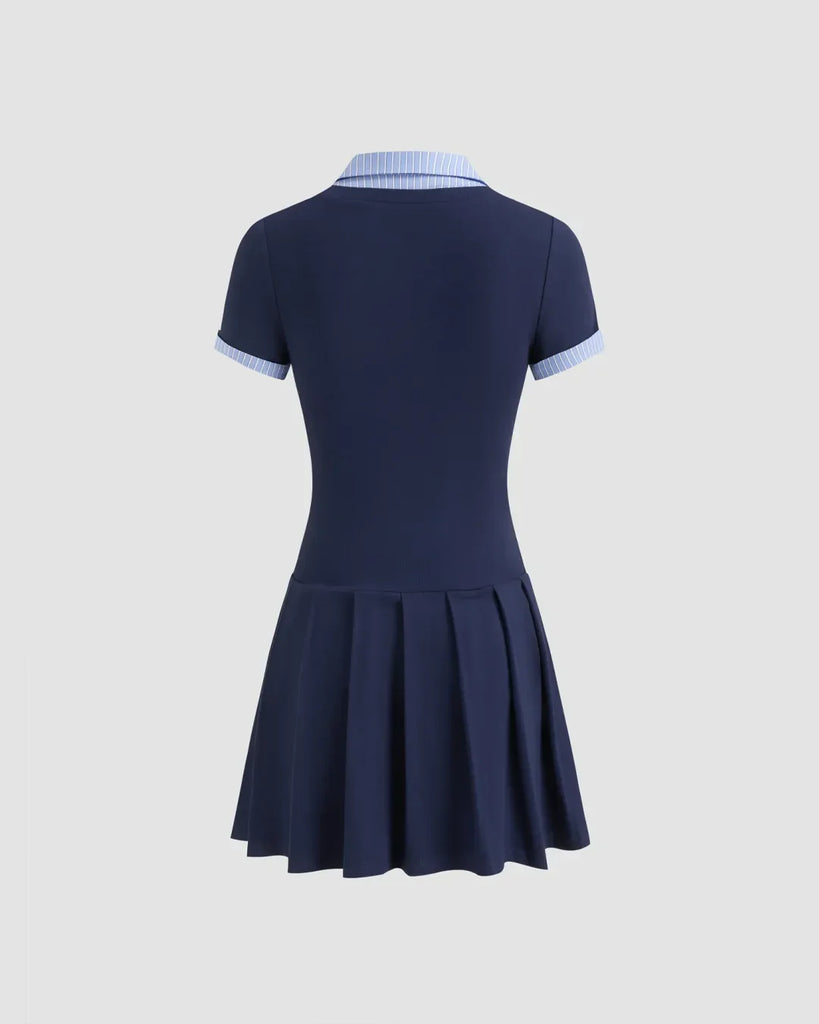 Navy blue knit fit-and-flare mini dress with a contrasting collar for a refined touch.