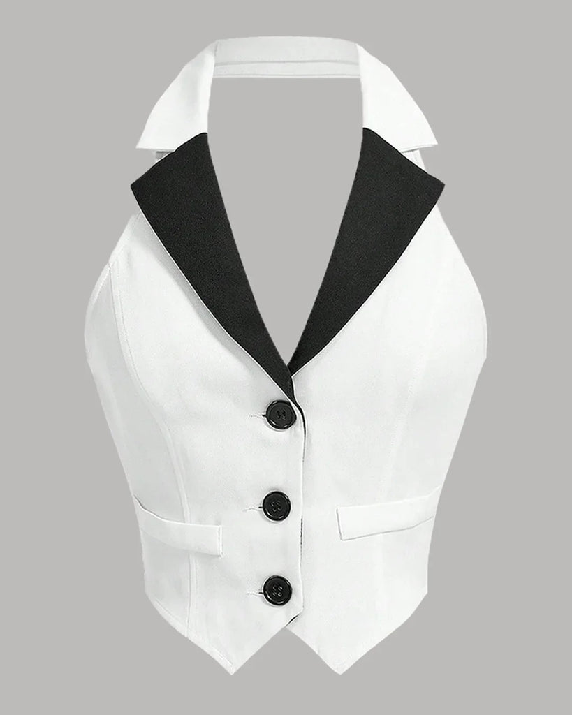 Contrast lapel sleeveless vest in black and white with black trims, featuring a button front design.