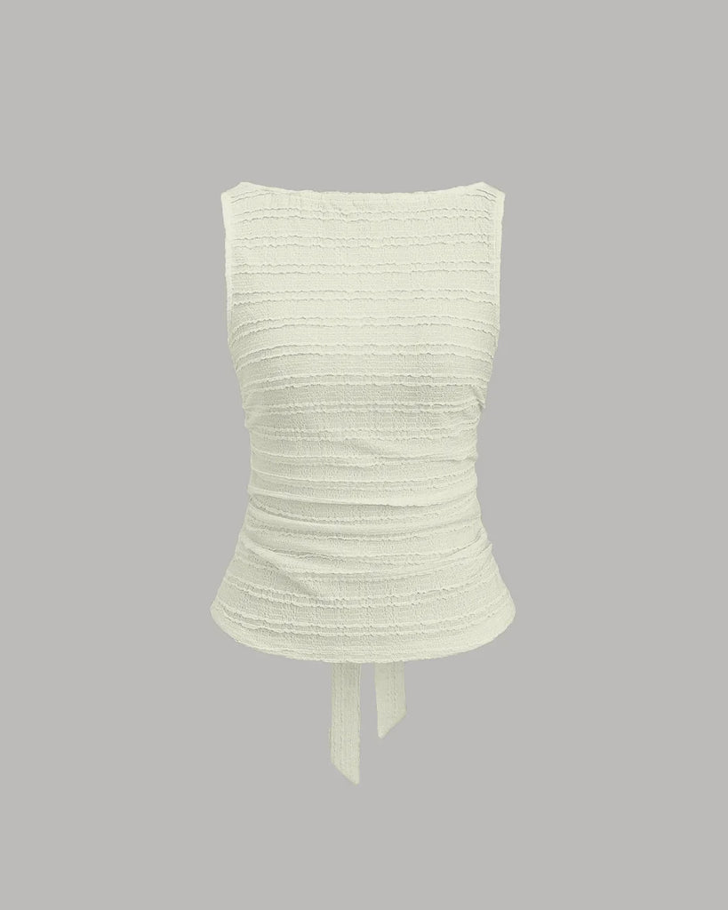 Cream ruched sleeveless tie back top with a stylish detail, perfect for a chic and casual look