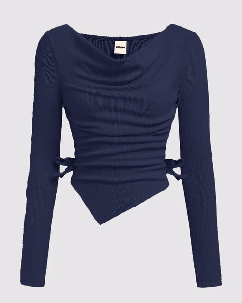 Front view of Navy blue crew neck top with long sleeves, cinched waist, and asymmetrical design.