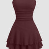 Front view of girls maroon dress with crinkle texture, ruched bandeau design and layered ruffle hem mini silhouette.