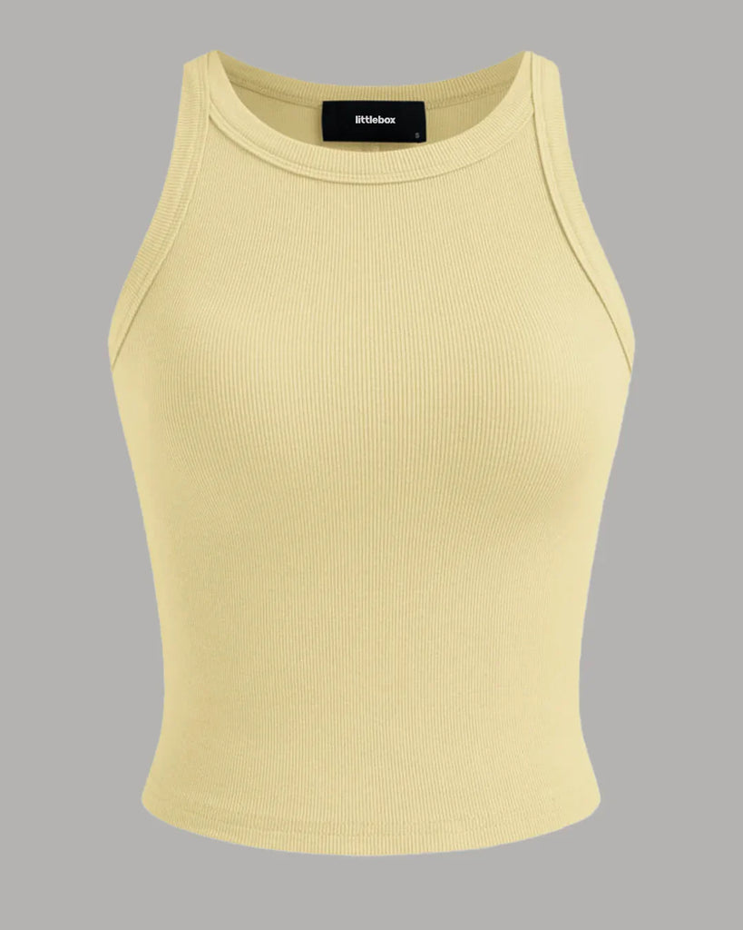 Vanilla cropped knit tank top in vanilla, made from soft, stretchy material for comfort and style.
