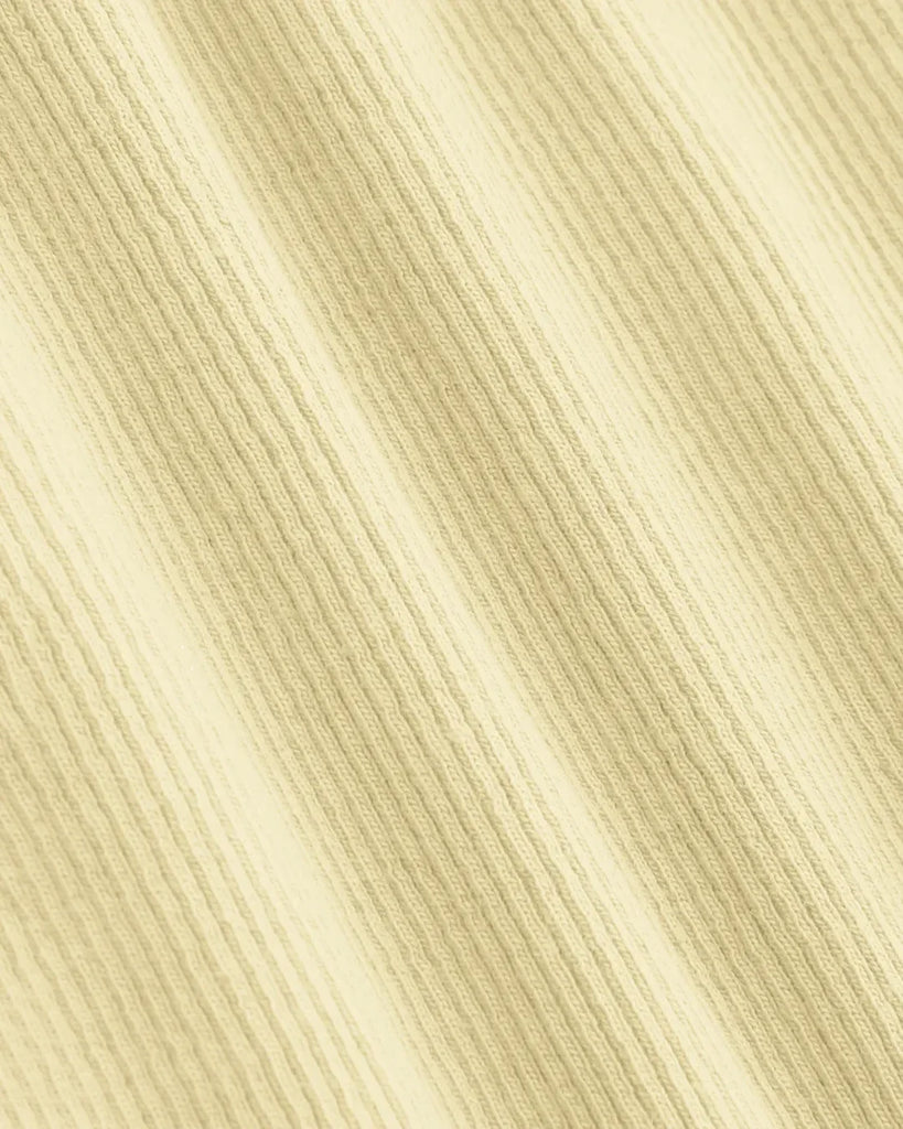 Closed view of a Vanilla cropped knit tank top in vanilla, made from soft, stretchy material for comfort and style.