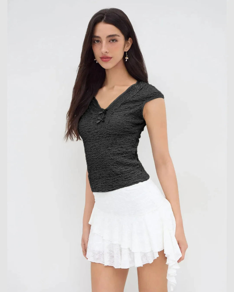 Women wearing Cute black V-neck tee featuring delicate lace trim and a bow, perfect for adding femininity to casual outfits 