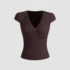 Cute brown V-neck tee featuring delicate lace trim and a bow, perfect for adding femininity to casual outfits