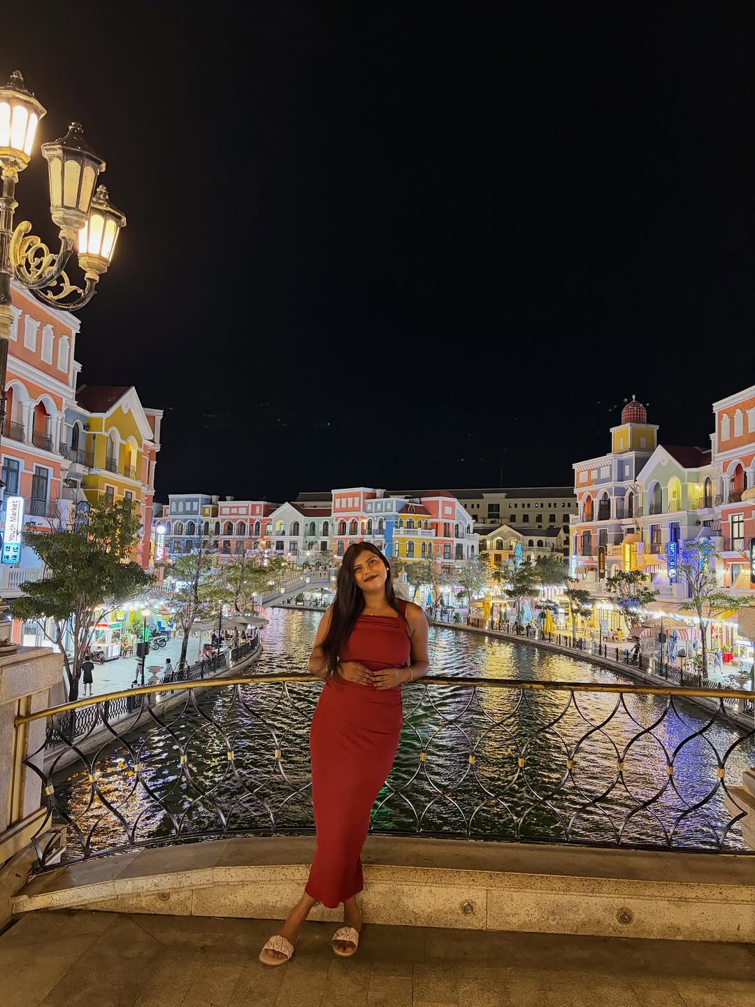 Customer photo 2 of Solid Ruched Sleeveless Ribbed Knit Dress In Cherry Red