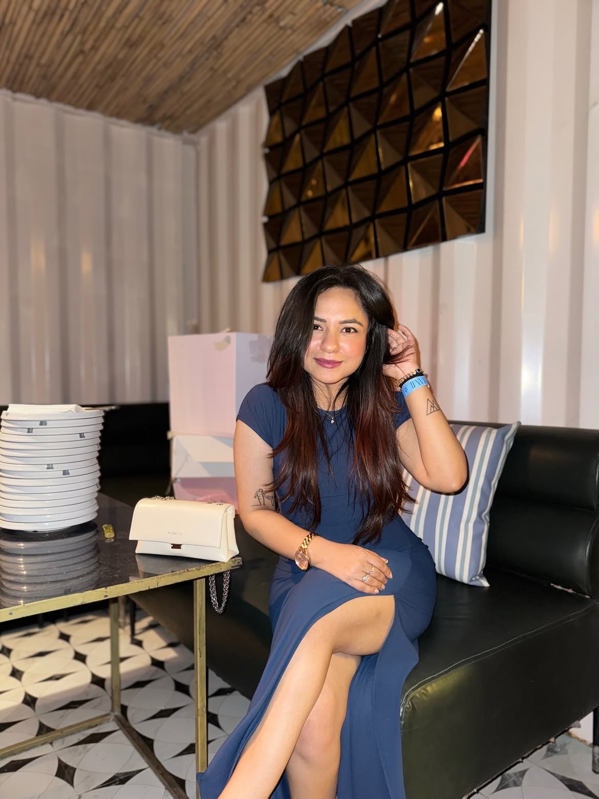 Customer photo 1 of Sleeveless Ruched Bodycon Midi Dress in Navy Blue