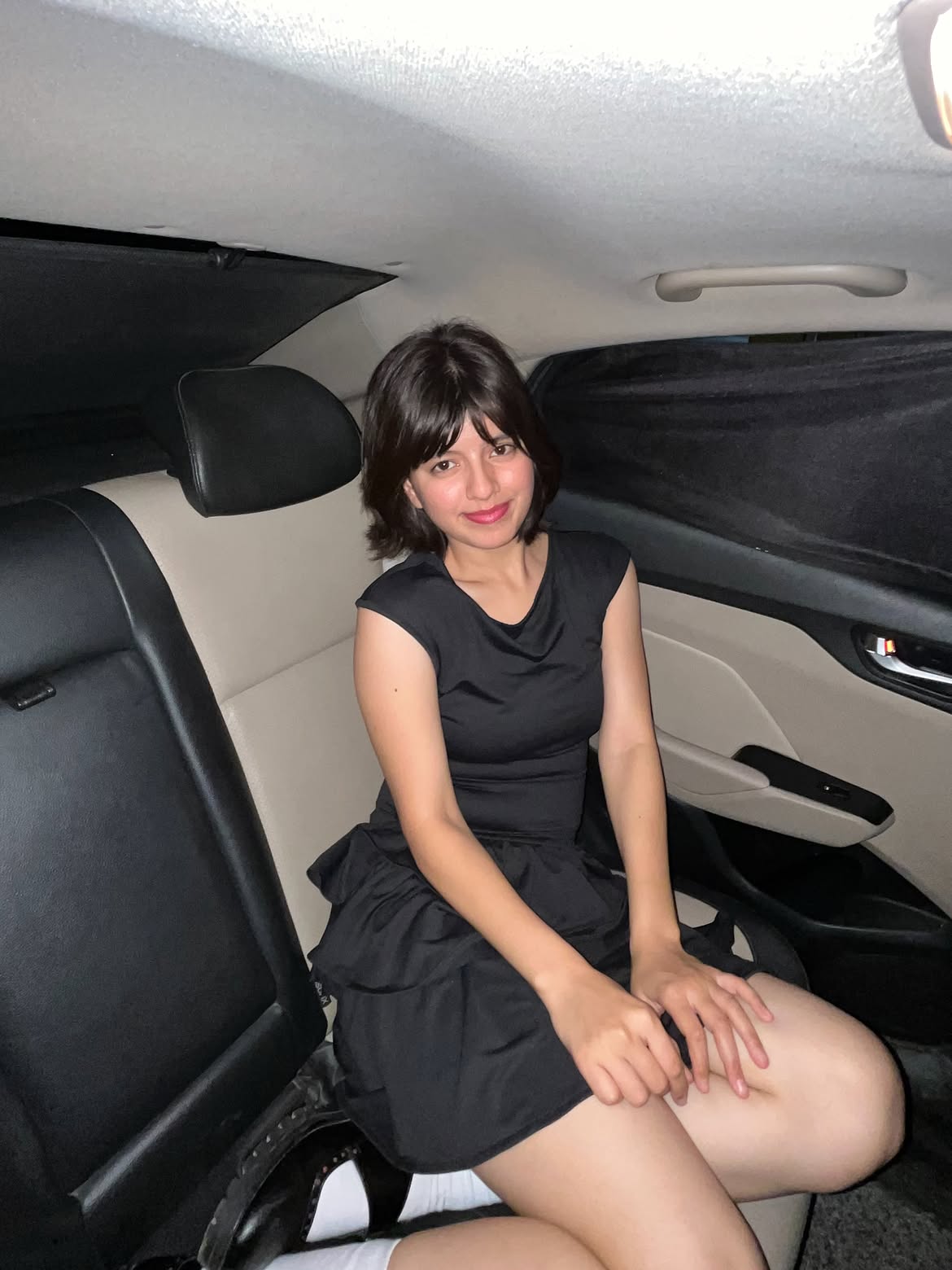 Customer photo 1 of Sleeveless Flared Ruffle Mini Dress in Black
