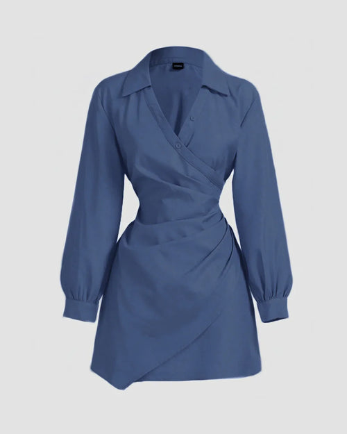 Front view of Blue full sleeve mini dress with wrap-style front, collared neckline and fitted waist, shown on a plain light background.
