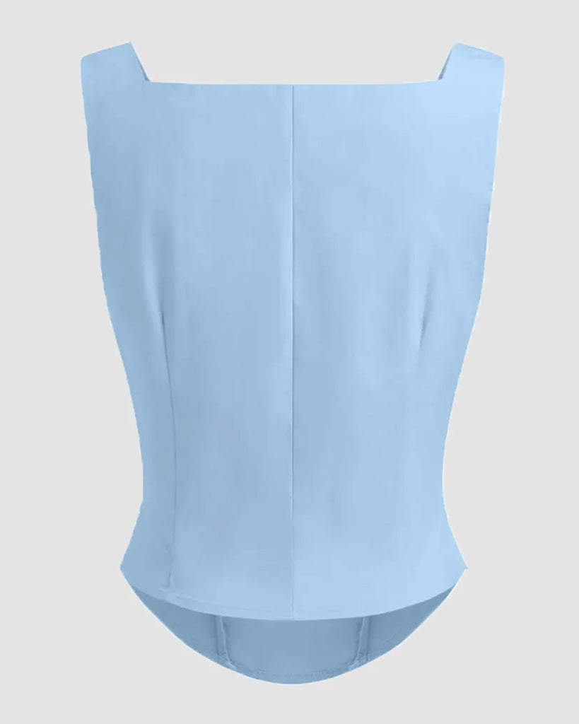 Back view of a Light blue sleeveless top with a draped cowl neck, designed for a stylish and comfortable look.