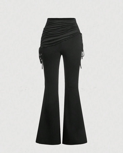 Front view of Black flare leg pants with ruched waist and side drawstrings for an adjustable, fitted look with flared hems.