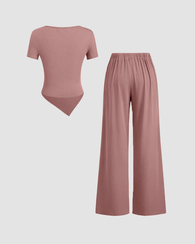 Dusty pink wrap v-neck top paired with wide leg pants in a coordinated set, showcasing a stylish and comfortable outfit.