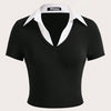 Front view of Black and white fitted T-shirt featuring a contrast collar, showcasing a color block knitted design.