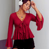 Women wearing Flared Sleeve V Neck Tie-Up Ruffle Top in Red