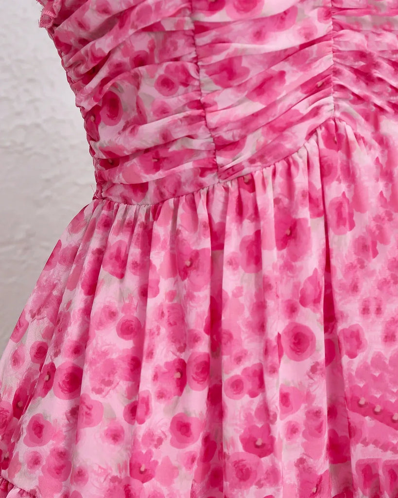 a Floral Mesh Fit & Flare Dress featuring a pink rose print design.

