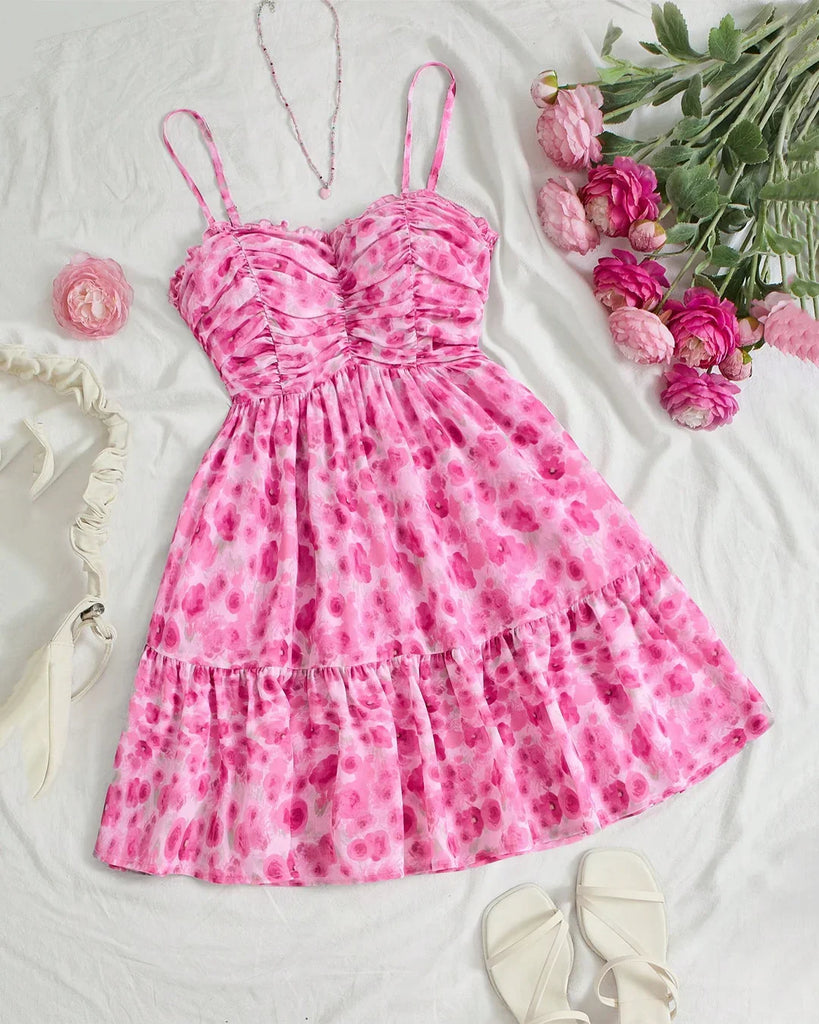 a Floral Mesh Fit & Flare Dress featuring a pink rose print design.
