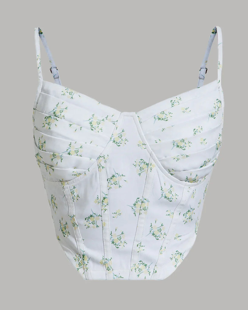 White floral print corset top with spaghetti straps displayed against a neutral background.