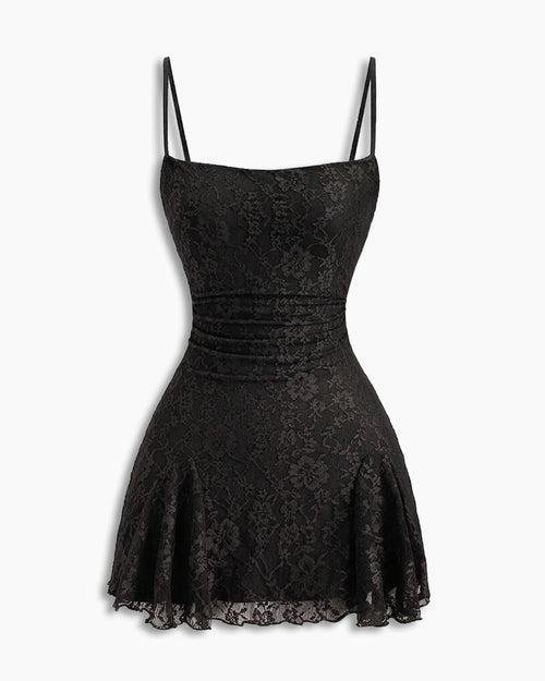 Front view of black floral bodycon dress with spaghetti straps, textured fabric and flared mini silhouette for a sleek look.
