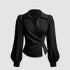 Front view of black top for women, designed with a V-neck wrap front and puff lantern long sleeves
