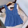 Front view of navy blue sleeveless top with front tie bow detail, loose fit and flared silhouette for a casual look.