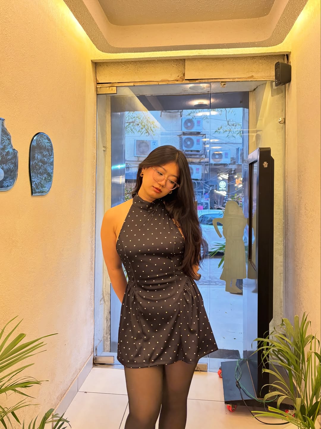 Customer photo 1 of Halter Neck Backless Polka Dot Mini Dress in Black