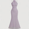 Front view of fishtail maxi dress in lilac with ruched bodice, halter neckline and elegant bodycon mermaid silhouette