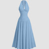 Front View of Powder blue halter neck maxi dress with flowy silhouette and gathered waist, elegant full-length design