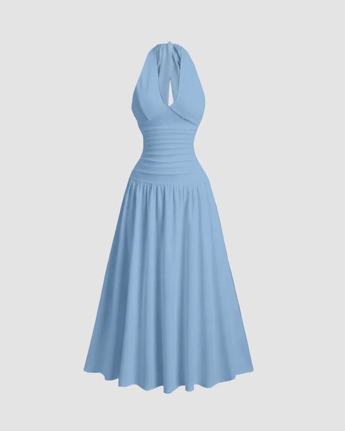 Front View of Powder blue halter neck maxi dress with flowy silhouette and gathered waist, elegant full-length design