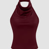 Front view of Maroon halter neck sleeveless crop top with slim fit and straight hem, solid design with sleek finish
