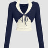 Front view of Blue white top with halter neck and straight hem, 2-in-1 layered crop design with full sleeves
