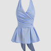 Front view of blue striped halter neck top with bow tie detail and ruffle hem, stylish striped top.