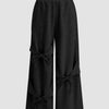 High-Rise Tie-Bow Cutout Wide Leg Pants in Black Front View For Women | Littlebox India
